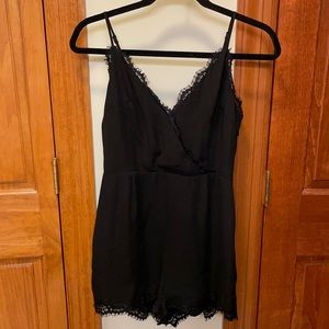 Bebe black romper